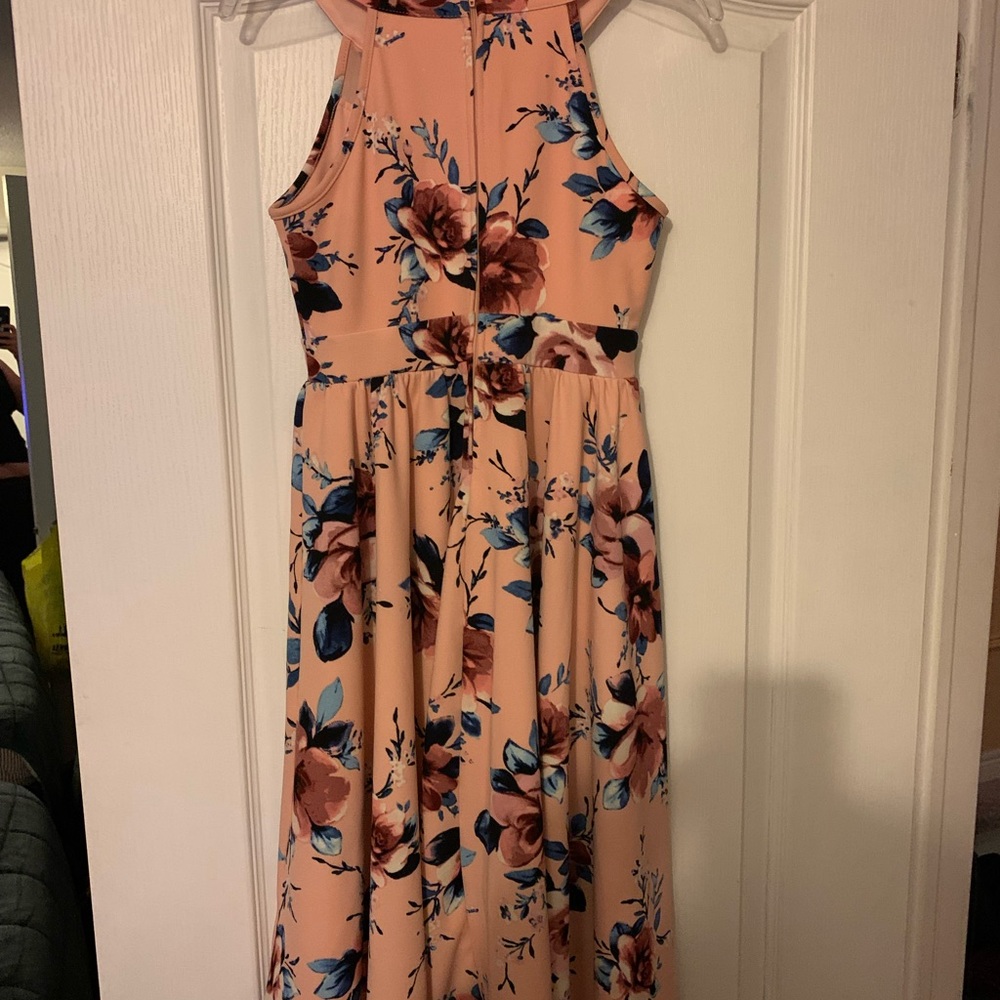 The front of the dress is shorter than than the back of the dress.